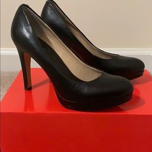 Black leather platform pumps